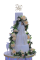 FROSTED CAKE,FOUR TIER,CHOCOLATE HAZELNUT FLAVORED,WHITE,UNIQUE AND TASTY,FOR WEDDINGS